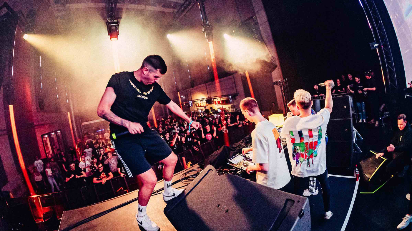 AXMO B2B KEVU B2B STVW Performing Live wearing Rave Culture Flame and Paint Splatters T-Shirt