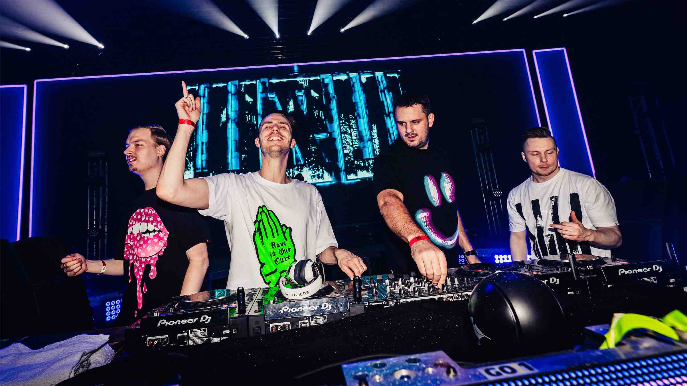 W&W x AXMO Performing Live wearing Rave Culture Lips, Rave Is Our Cure, Smiley and White Rave Culture Emblem T-Shirts